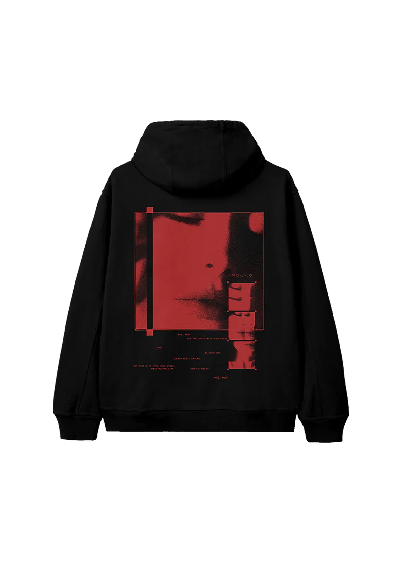 Back of black Eternal Sunshine hoodie with a large red-tinted close-up image of Ariana Grande’s lips and cheek, paired with pixelated text and glitch effects.