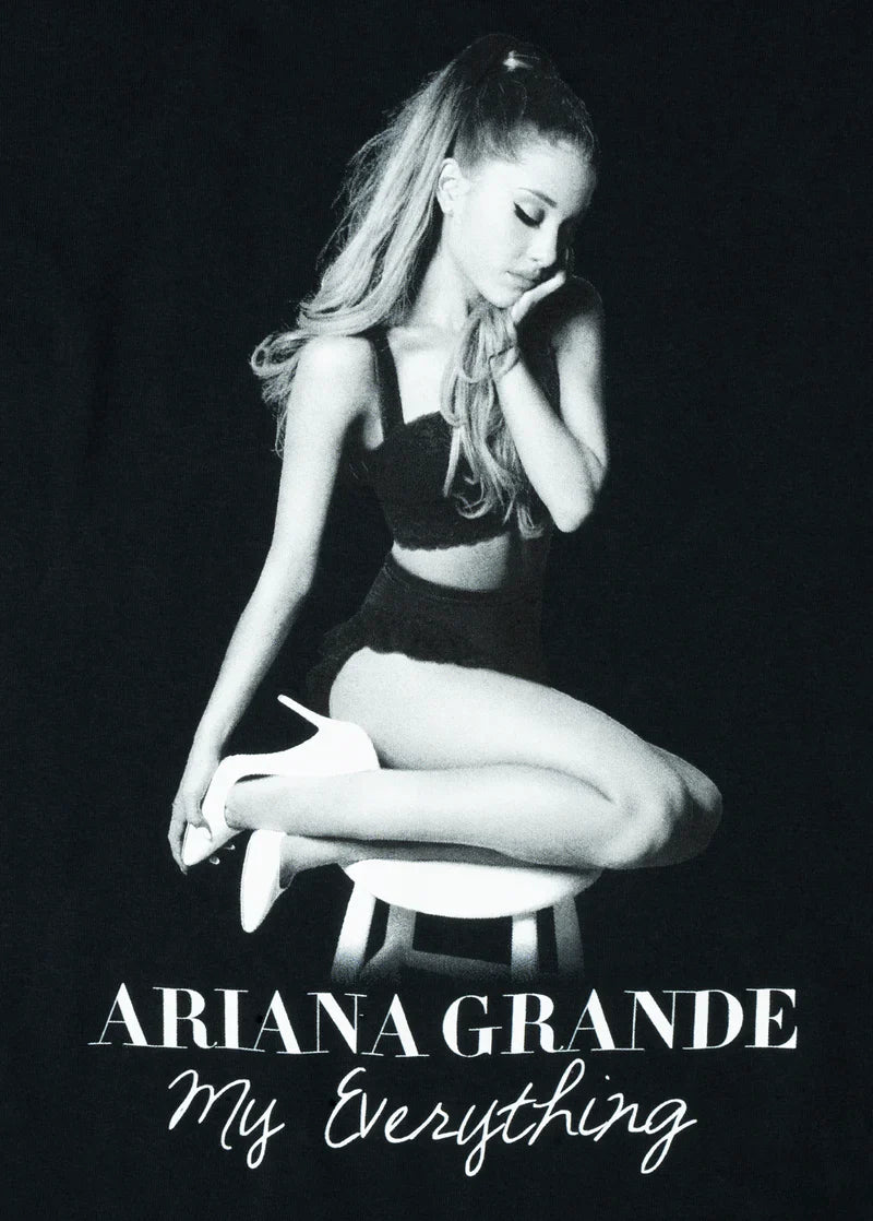 Close-up of the My Everything black and white graphic on Ariana Grande’s t-shirt, showing Ariana in grayscale with elegant serif and handwritten-style album title text.