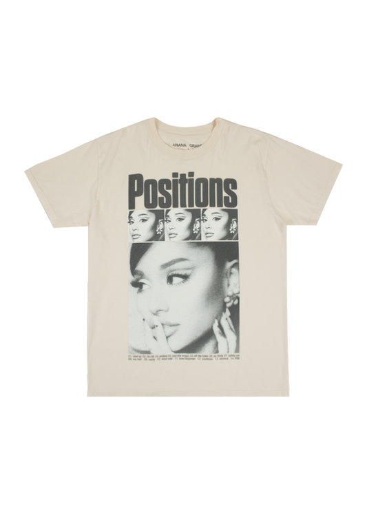 Off-white Ariana Grande t-shirt featuring a bold 'Positions' title, a film strip-style layout of Ariana’s headshots, and a large black-and-white portrait beneath. The shirt includes the full album tracklist in small text across the bottom.
