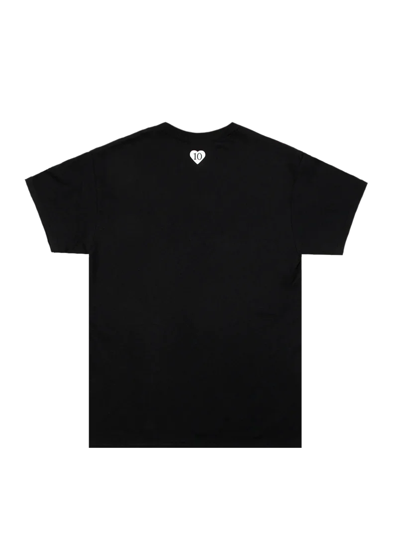 Back of the t-shirt featuring a small white heart graphic with the number '10' printed inside, placed just below the neckline. A subtle nod to the 10-year milestone of 'Yours Truly.'
