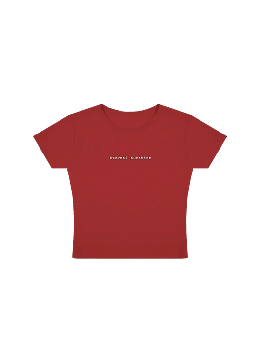 Fitted red cropped t-shirt with minimalist lowercase white text reading “eternal sunshine” across the chest — sleek and simple design inspired by Ariana Grande’s eternal sunshine album aesthetic.