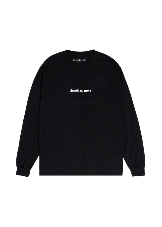 Black Ariana Grande long sleeve t-shirt featuring minimalist white embroidered text on the chest that reads “thank u, next.” A sleek, understated piece inspired by her chart-topping single.
