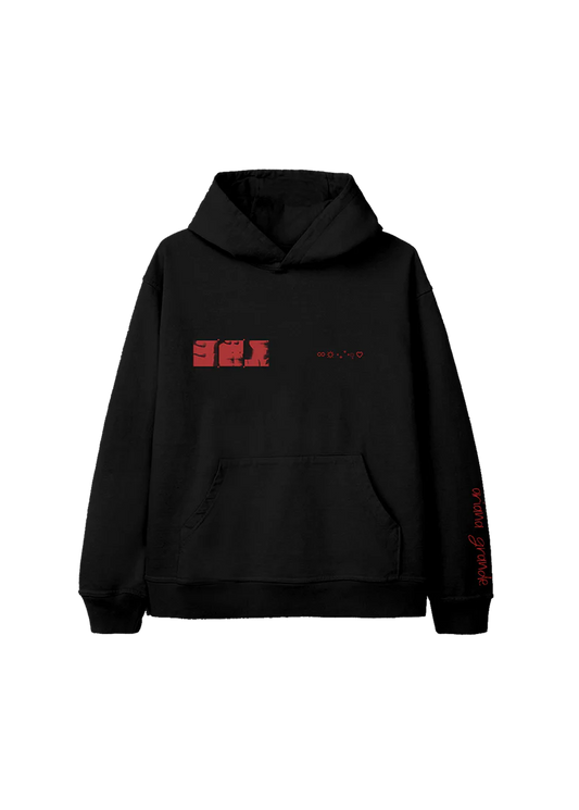 Black Ariana Grande Eternal Sunshine hoodie featuring a red glitch-style close-up photo grid and celestial symbols across the chest, with 'ariana grande' in red on the sleeve.