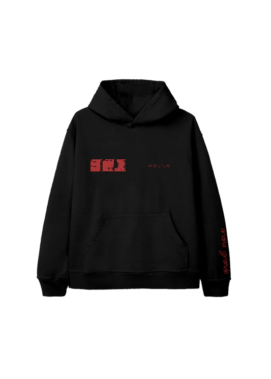 Black Ariana Grande Eternal Sunshine hoodie featuring a red glitch-style close-up photo grid and celestial symbols across the chest, with 'ariana grande' in red on the sleeve.