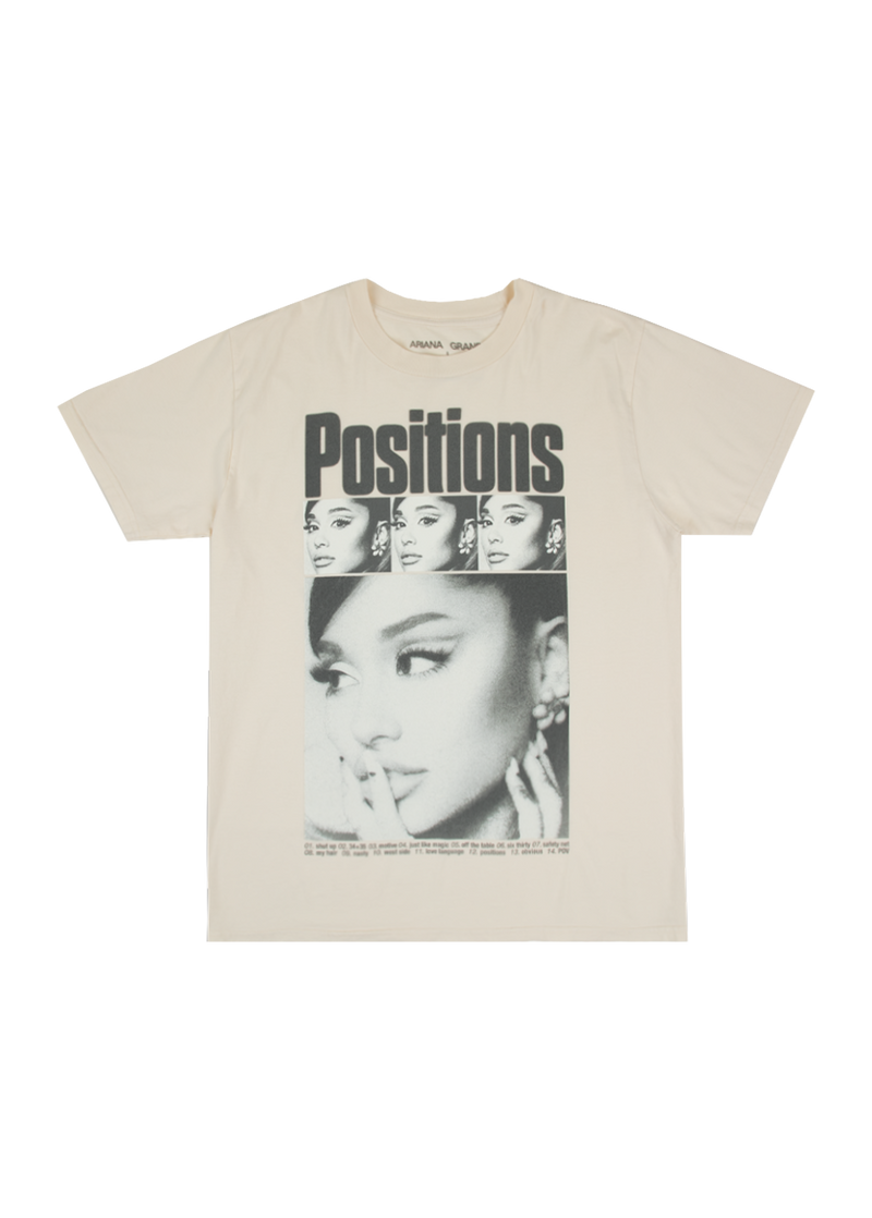Off-white Ariana Grande t-shirt featuring a bold 'Positions' title, a film strip-style layout of Ariana’s headshots, and a large black-and-white portrait beneath. The shirt includes the full album tracklist in small text across the bottom.