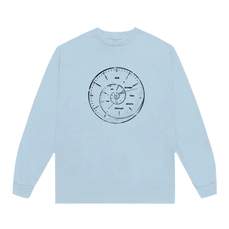 Light blue Ariana Grande long sleeve t-shirt with a black spiral clock graphic on the chest and the words “did I dream the whole thing?” — from the Twilight Zone merch collection.

