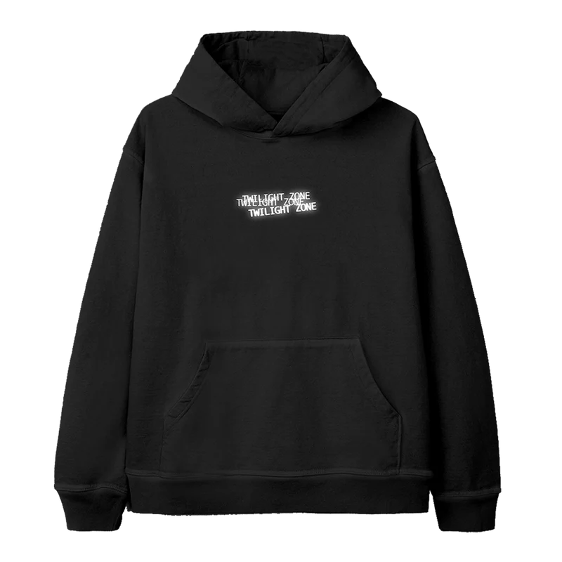 Black Ariana Grande hoodie featuring a minimalist “Twilight Zone” text design in white, stacked and slightly staggered across the chest — part of the official Twilight Zone merch collection.


