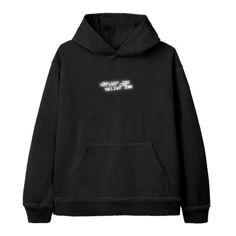 Black Ariana Grande hoodie featuring a minimalist “Twilight Zone” text design in white, stacked and slightly staggered across the chest — part of the official Twilight Zone merch collection.

