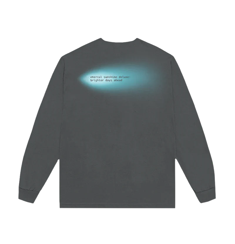 Back of a dark long sleeve tee with glowing cyan text reading “eternal sunshine deluxe: brighter days ahead” centered near the shoulders — soft spotlight effect adds a dreamy aesthetic.

