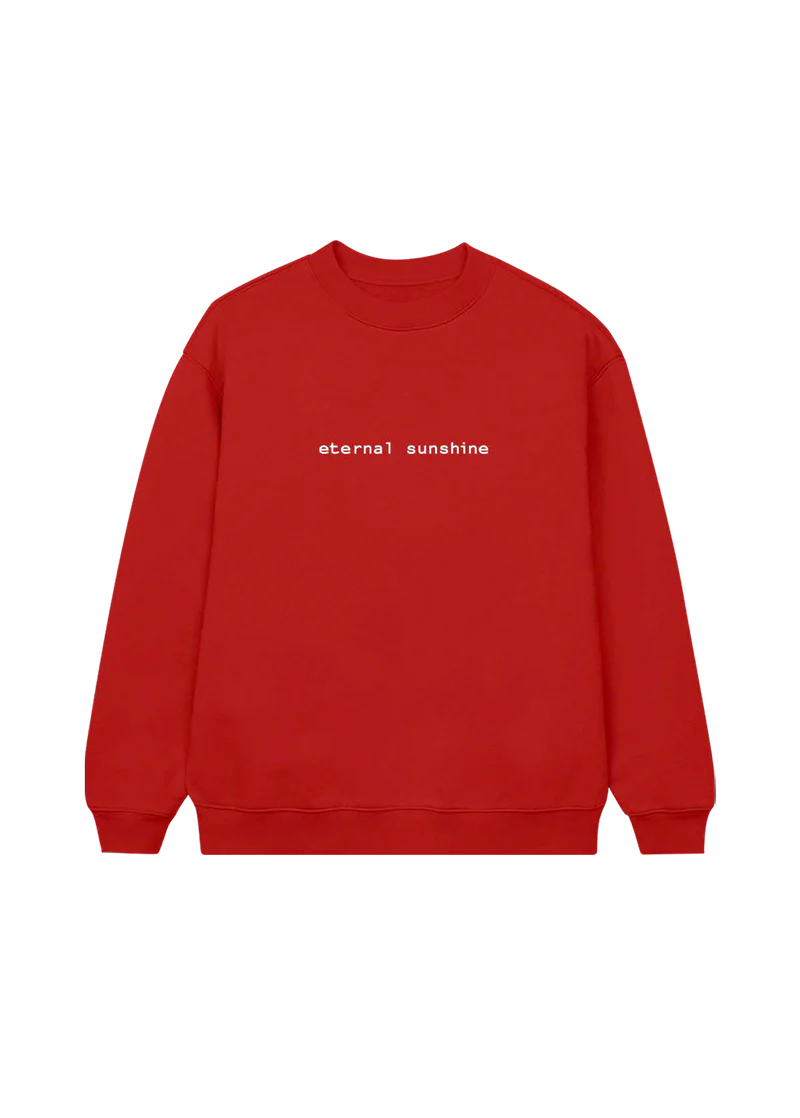 Bright red Ariana Grande crewneck sweatshirt featuring minimalist white text across the chest that reads “eternal sunshine.” Cozy and bold, this statement piece is inspired by Ariana’s Eternal Sunshine album aesthetic.

