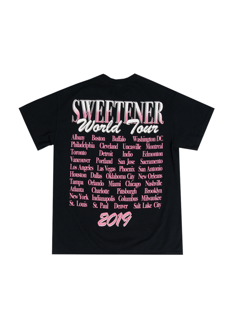 Back of black Ariana Grande t-shirt featuring “Sweetener World Tour” in bold pink and white lettering with a full list of 2019 tour cities, including New York, Los Angeles, Toronto, Miami, and more. A collector’s dream for tour merch fans.

