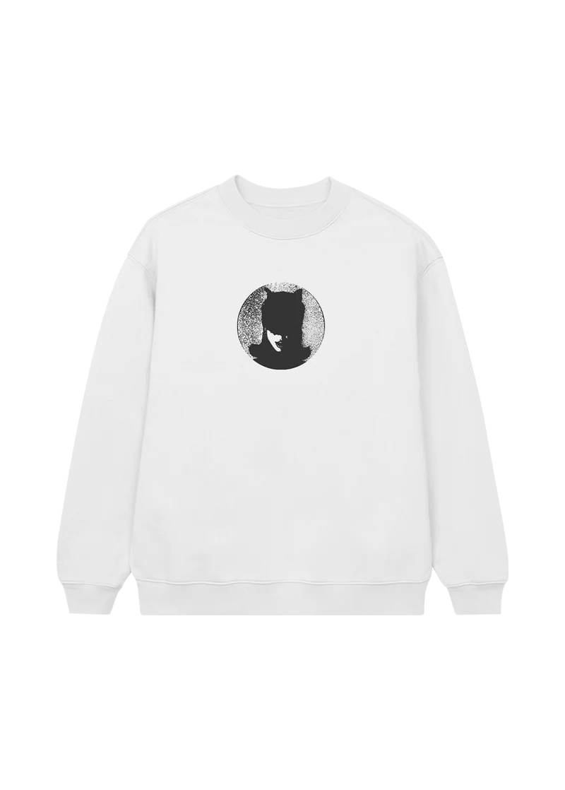 White crewneck sweatshirt with a centered black circular graphic of Ariana Grande in a cat mask, silhouetted against a textured gray background — minimal yet bold design inspired by the boy is mine.

